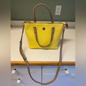 Anne Klein Yellow Pocketbook with shoulder strap.